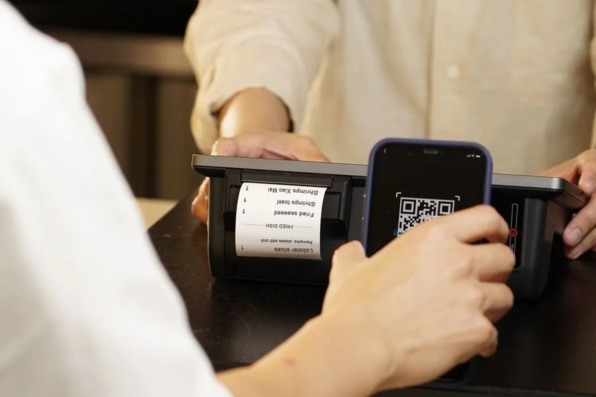 Pagamento por QR Code consultado pelo celular
